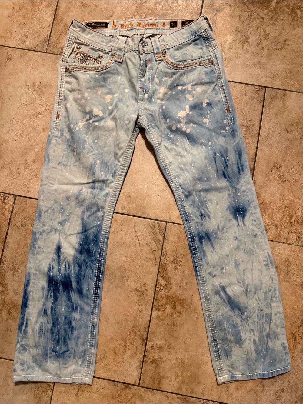 Rock Revival Light Blue Jeans with Paint-Splatter and Washed Accents